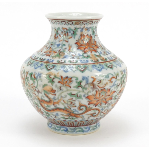 283 - Chinese doucai porcelain vase hand painted dragons amongst flowers, six figure character marks to th... 