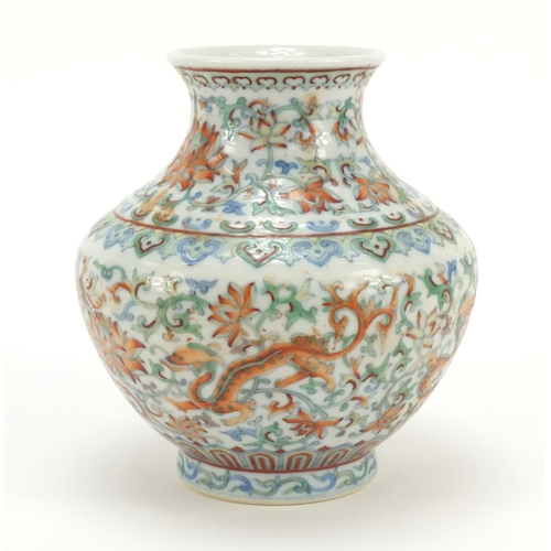 283 - Chinese doucai porcelain vase hand painted dragons amongst flowers, six figure character marks to th... 