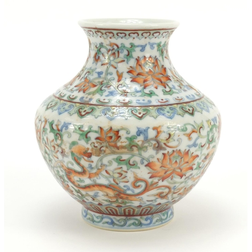 283 - Chinese doucai porcelain vase hand painted dragons amongst flowers, six figure character marks to th... 