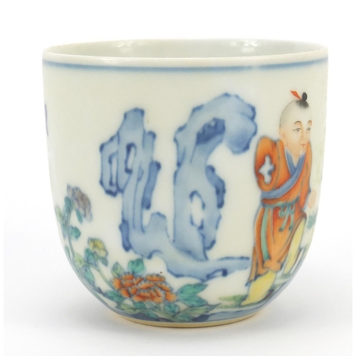 216 - Chinese doucai porcelain tea cup, hand painted with a young boy and chicken, calligraphy to the reve... 