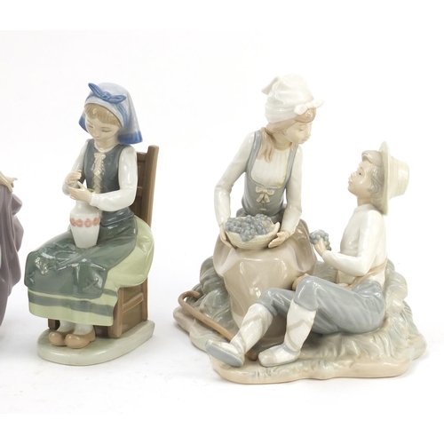 487 - Four Lladro and Nao figure groups, the largest 23cm high