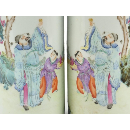 279 - Pair of Chinese porcelain sleeve vases, hand painted in the famille rose palette with figures in a g... 