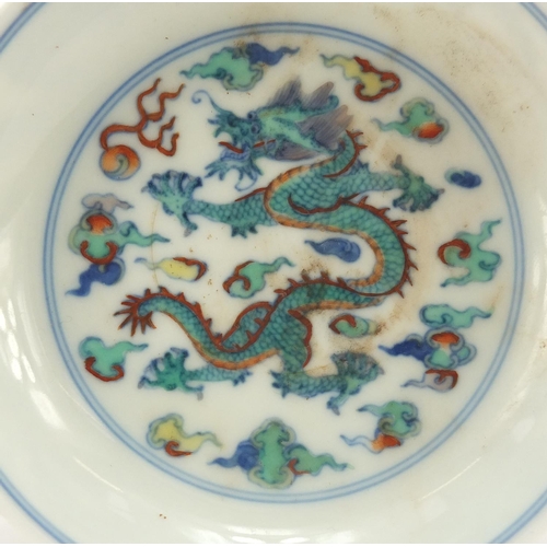 220 - Chinese doucai porcelain dish hand painted with dragons in clouds chasing flaming pearls, six figure... 