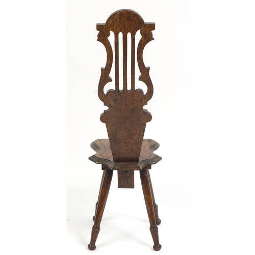 1335 - Decorative oak chair carved with peacock heads, 91cm high