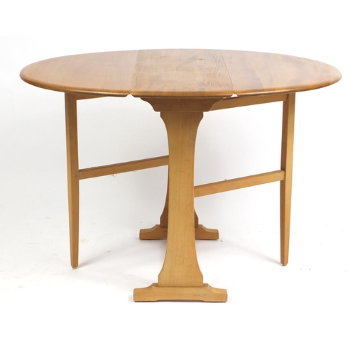 1312 - Ercol Windsor elm gateleg table, 71cm H x 110cm W (extended) x 84cm D