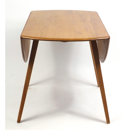 1302 - Ercol light elm drop leaf dining table, 71cm H x 120cm W (extended) x 112cm D