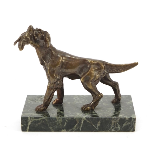 405 - Patinated bronze Pointer dog raised on a rectangular green marble base, 14cm wide