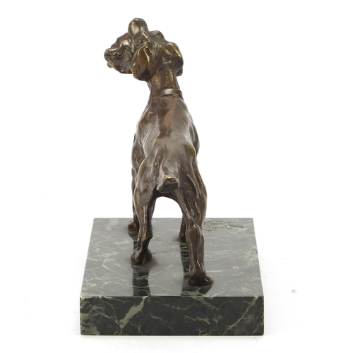 405 - Patinated bronze Pointer dog raised on a rectangular green marble base, 14cm wide