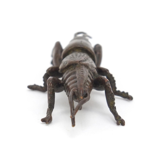 1994 - Japanese patinated bronze insect, impressed character marks to the underside, 7cm in length