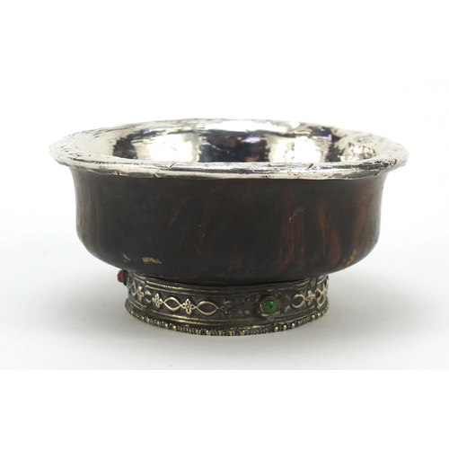 614 - Middle eastern hardwood bowl with unmarked silver mounts, 13cm diameter