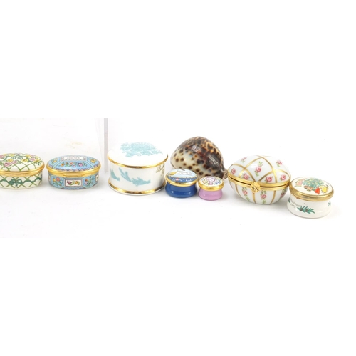 2008 - Collectables arranged in a cabinet including eight Halcyon Days enamel trinket boxes, silver and ena... 