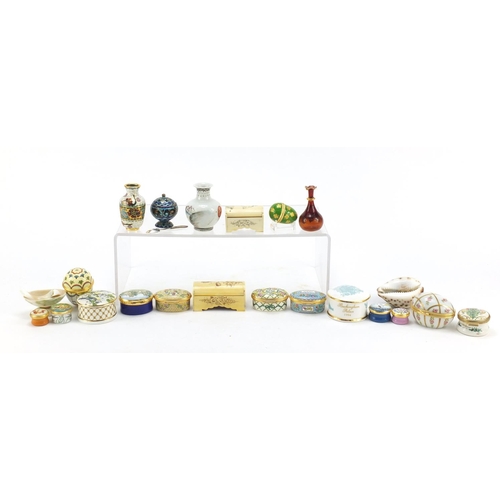 2008 - Collectables arranged in a cabinet including eight Halcyon Days enamel trinket boxes, silver and ena... 