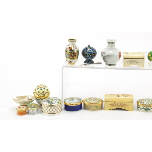 2008 - Collectables arranged in a cabinet including eight Halcyon Days enamel trinket boxes, silver and ena... 