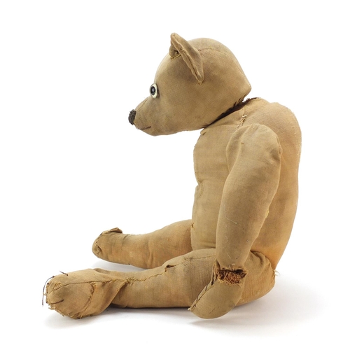 748 - Antique golden straw filled teddy bear with articulated limbs, 58cm high