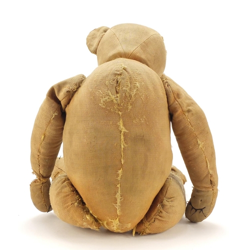 748 - Antique golden straw filled teddy bear with articulated limbs, 58cm high