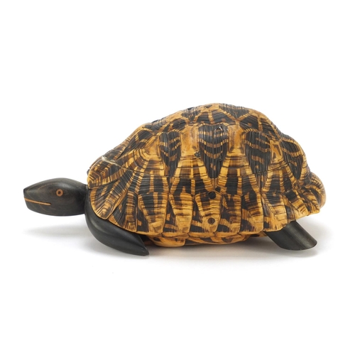 237 - Anglo-Indian star tortoise tea caddy with ebony, fruitwood and exotic inlay, 26cm in length