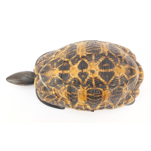 237 - Anglo-Indian star tortoise tea caddy with ebony, fruitwood and exotic inlay, 26cm in length