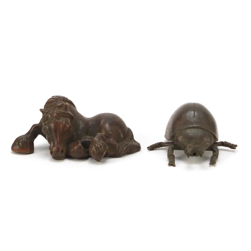 580 - Two Japanese patinated bronze animals, each with impressed marks to the bases, the largest 7cm in le... 