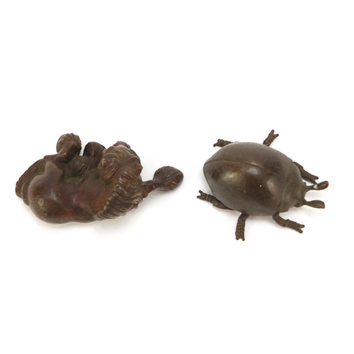 580 - Two Japanese patinated bronze animals, each with impressed marks to the bases, the largest 7cm in le... 