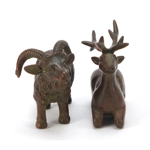 581 - Two Japanese patinated bronze models of animals, one with impressed marks to the base, the largest 9... 