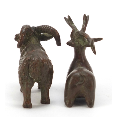 581 - Two Japanese patinated bronze models of animals, one with impressed marks to the base, the largest 9... 