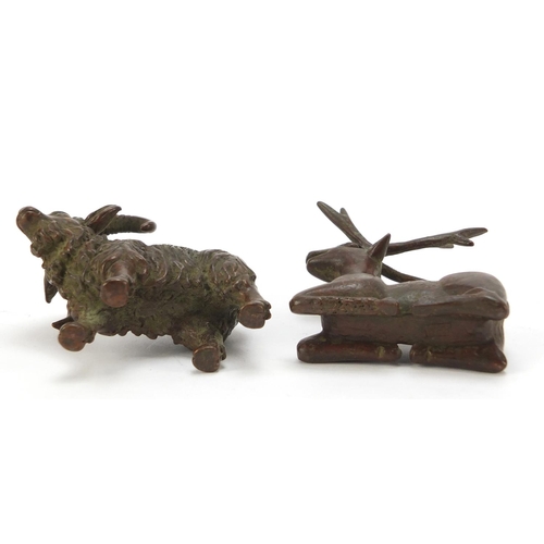 581 - Two Japanese patinated bronze models of animals, one with impressed marks to the base, the largest 9... 