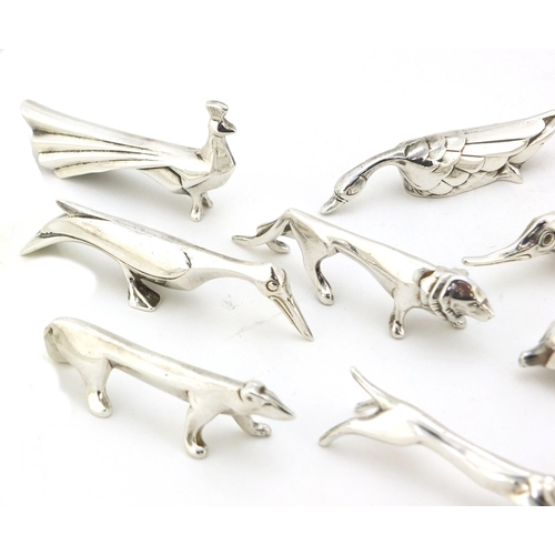 101 - Twelve Art Deco silver plated knife rests in the form of stylised animals, 7.5cm long