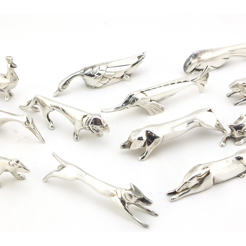 101 - Twelve Art Deco silver plated knife rests in the form of stylised animals, 7.5cm long