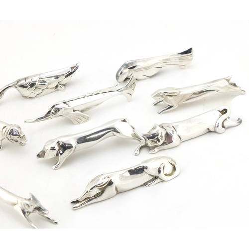 101 - Twelve Art Deco silver plated knife rests in the form of stylised animals, 7.5cm long