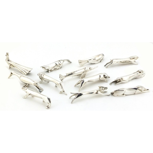 101 - Twelve Art Deco silver plated knife rests in the form of stylised animals, 7.5cm long