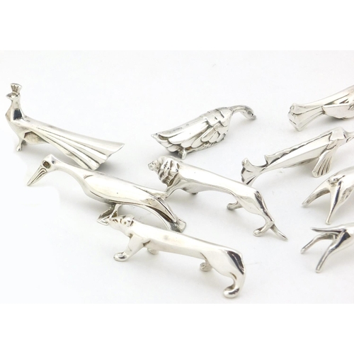 101 - Twelve Art Deco silver plated knife rests in the form of stylised animals, 7.5cm long