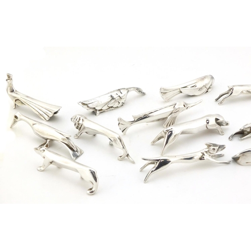 101 - Twelve Art Deco silver plated knife rests in the form of stylised animals, 7.5cm long