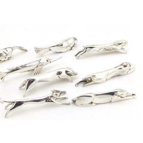 101 - Twelve Art Deco silver plated knife rests in the form of stylised animals, 7.5cm long