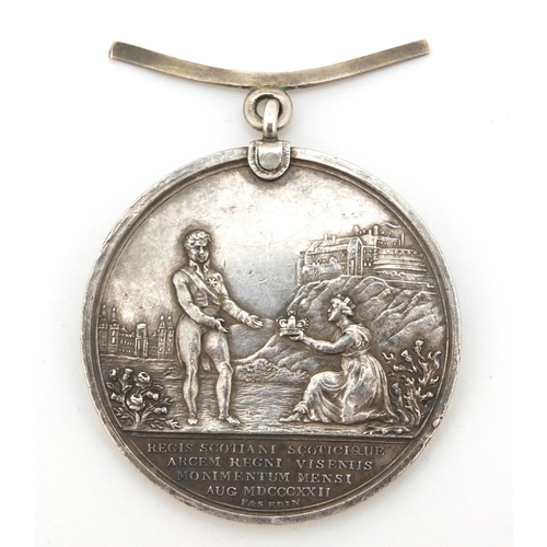 529 - George IV silver medallion Commemorating the visit of George IV to Scotland, inscribed Presented by ... 