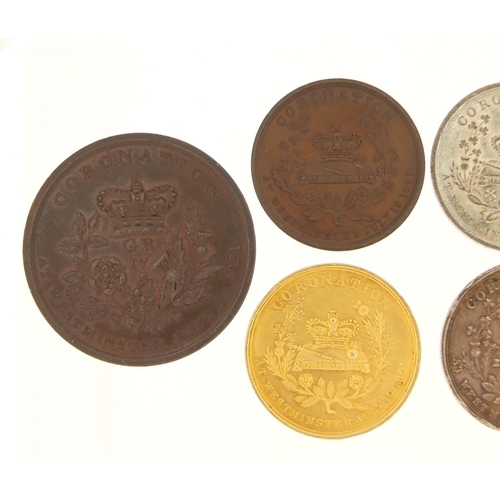 530 - Six George IV coronation medals dated 1821 including two silver, the largest 4.6cm in diameter