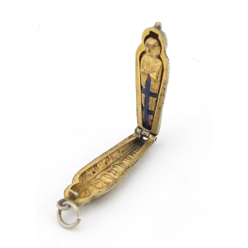 599 - Egyptian Revival unmarked silver and enamel Tutankhamun pendant opening to reveal an enamel mummy, 3... 