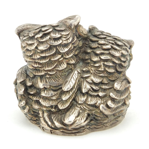 305 - Novelty silver filled model of two owls with glass eyes, 4.2cm high