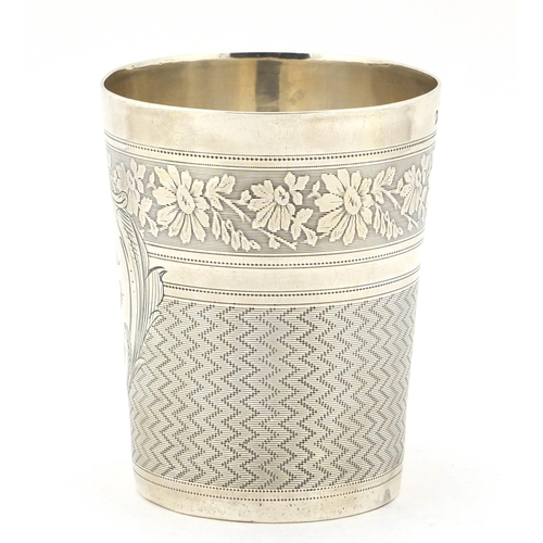 269 - French silver engine turned beaker engraved with flowers, impressed marks to the base, 7.5cm high, 6... 