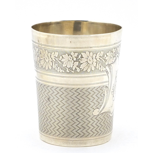 269 - French silver engine turned beaker engraved with flowers, impressed marks to the base, 7.5cm high, 6... 