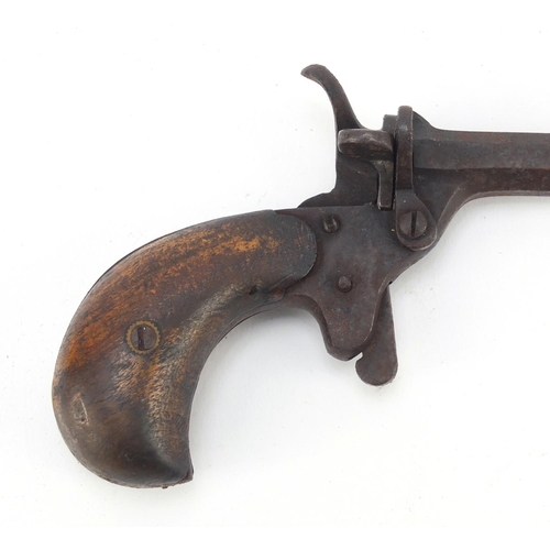 660 - ***WITHDRAWN***19th century garter pistol with wooden grip, 14.5cm in length