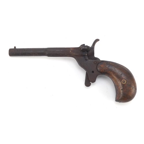 660 - ***WITHDRAWN***19th century garter pistol with wooden grip, 14.5cm in length