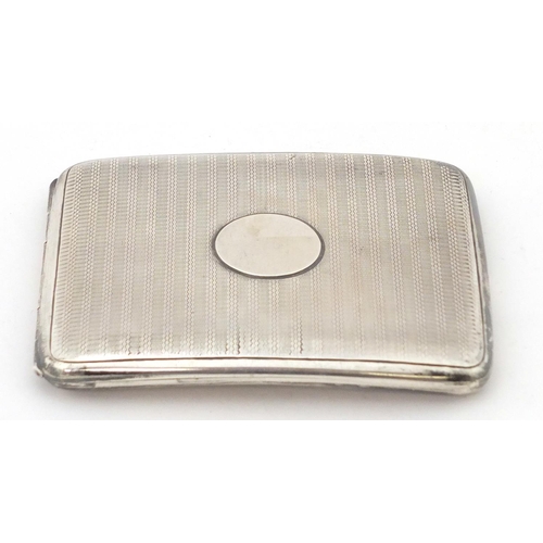 763 - Zachariah Barraclough & Sons, rectangular silver cigarette case, Chester 1914, 10cm wide, 138.2g