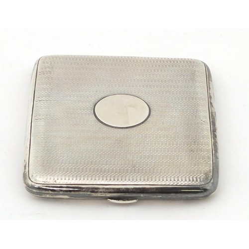 763 - Zachariah Barraclough & Sons, rectangular silver cigarette case, Chester 1914, 10cm wide, 138.2g