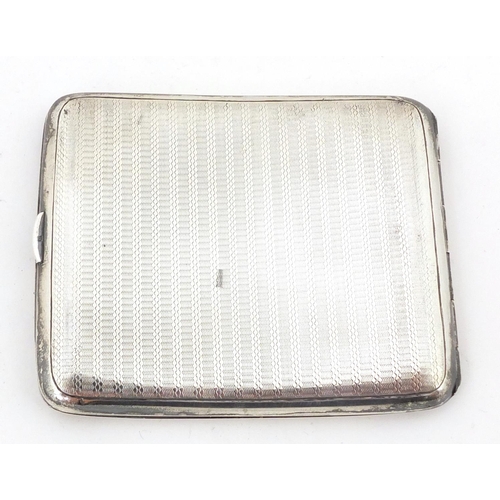 763 - Zachariah Barraclough & Sons, rectangular silver cigarette case, Chester 1914, 10cm wide, 138.2g