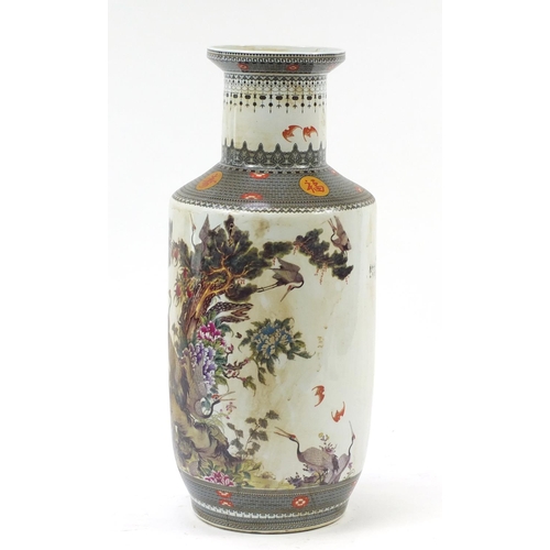 284 - Large Chinese porcelain rouleau vase decorated with cranes in a landscape with peach trees and flowe... 