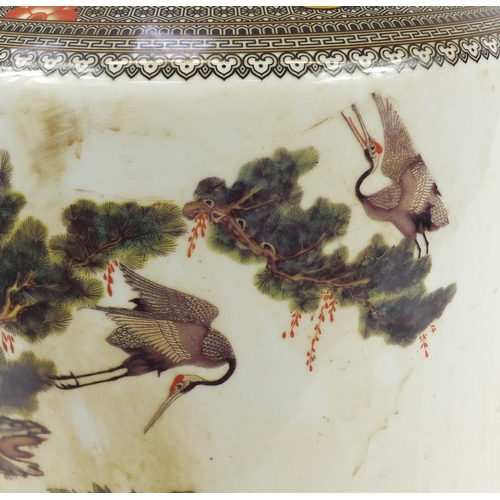 284 - Large Chinese porcelain rouleau vase decorated with cranes in a landscape with peach trees and flowe... 