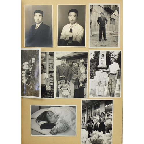 501 - Two vintage Japanese black and white photograph albums and a photographic book entitled Our Beautifu... 