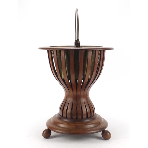 148 - Regency style inlaid mahogany ice bucket with brass liner and swing handle, 41cm high