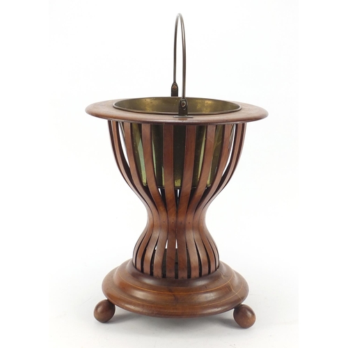 148 - Regency style inlaid mahogany ice bucket with brass liner and swing handle, 41cm high