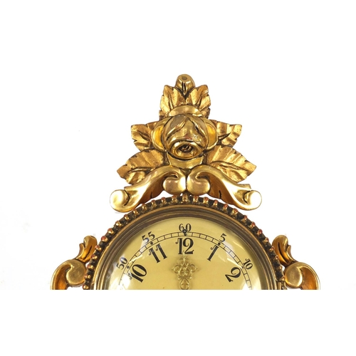 85 - Ornate gilt wood cartel type clock with Arabic numerals, 49cm high